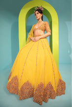 Load image into Gallery viewer, yellow net lehenga set with organza dupattat and blouse