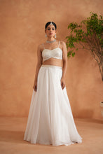 Load image into Gallery viewer, Ivory embroidered bustier, lehenga and short jacket