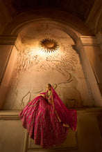 Load image into Gallery viewer, FUSCHIA RED RAW SILK BRIDAL LEHENGA CHOLI WITH A TULLE DUPATTA AND AN OPTIONAL SECOND TULLE DUPATTA