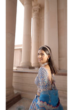 Load image into Gallery viewer, PEACOCK BLUE TAFETTA LEHENGA CHOLI WITH A TULLE DUPATTA AND BELT