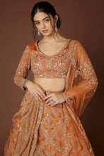 Load image into Gallery viewer, Rust raw silk hand embroidered lehenga