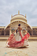 Load image into Gallery viewer, GOLD TISSUE LEHENGA CHOLI WITH A PEACH TISSUE DUPATTA AND AN OPTIONAL RED DUPTTA AND BELT WHICH CAN BE ORDERED SEPATATELY.
