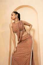 Load image into Gallery viewer, Intricate embelishments of cutdana, beads, and crystal stones, all over blouse, twisted dupatta, and skirt