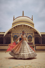 Load image into Gallery viewer, GOLD TISSUE LEHENGA CHOLI WITH A PEACH TISSUE DUPATTA AND AN OPTIONAL RED DUPTTA AND BELT WHICH CAN BE ORDERED SEPATATELY.
