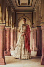 Load image into Gallery viewer, GOLD RAW SILK LEHENGA CHOLI WITH A NET DUPATTA ALONG WITH AN OPTIONAL SECOND DUPATTA AND BELT