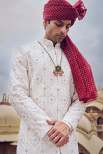 Load image into Gallery viewer, IVORY RAW SILK SHERWANI WITH A COTTON SILK CHOGA AND CHURIDAR AND OPTIONAL STOLE BELT AND WORKED JUTI