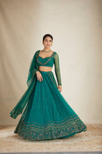 Load image into Gallery viewer, TEAL GREEN ANTIQUE SEQ WORK LEHENGA SET