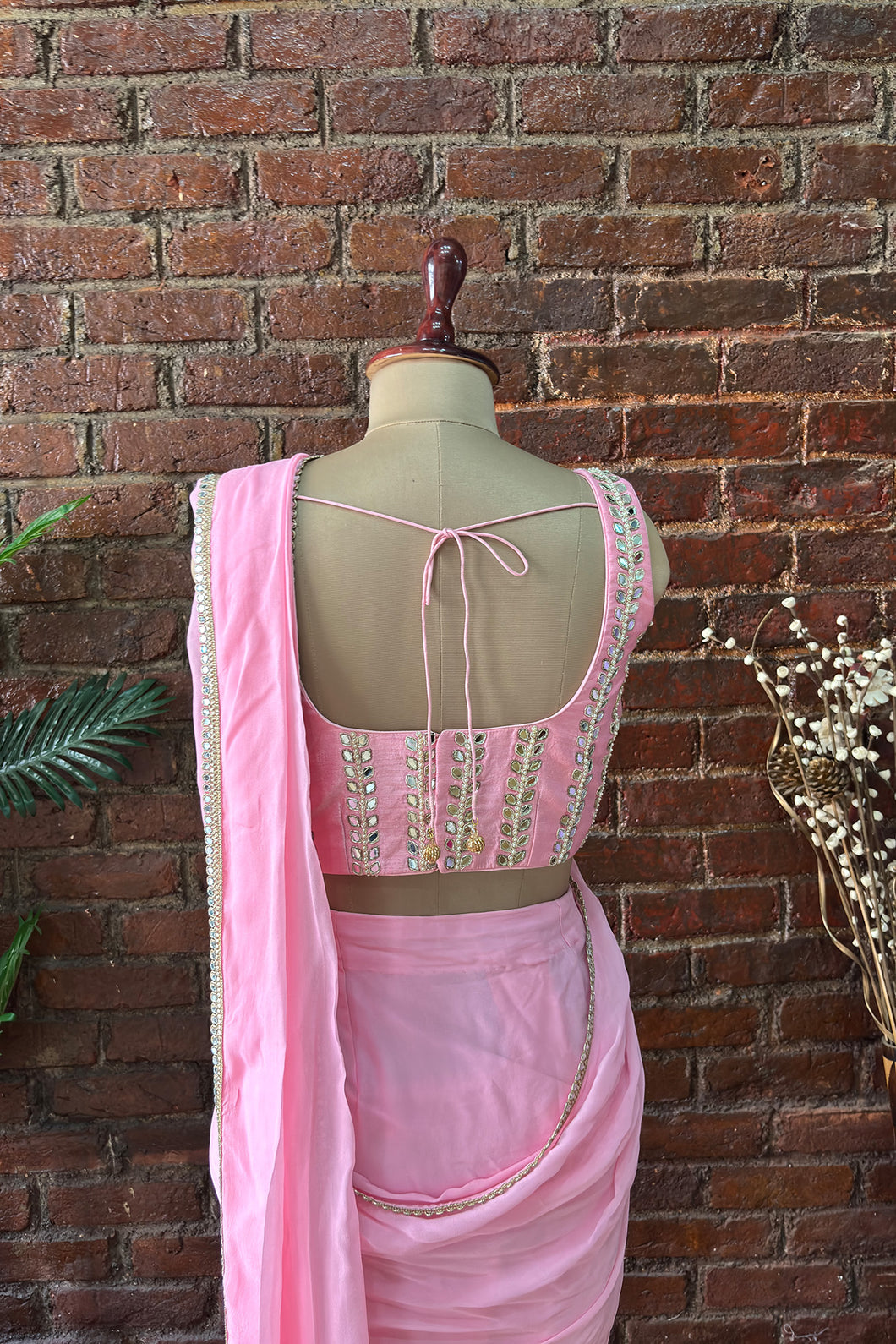 Pink Pre-draped saree with mirror work blouse