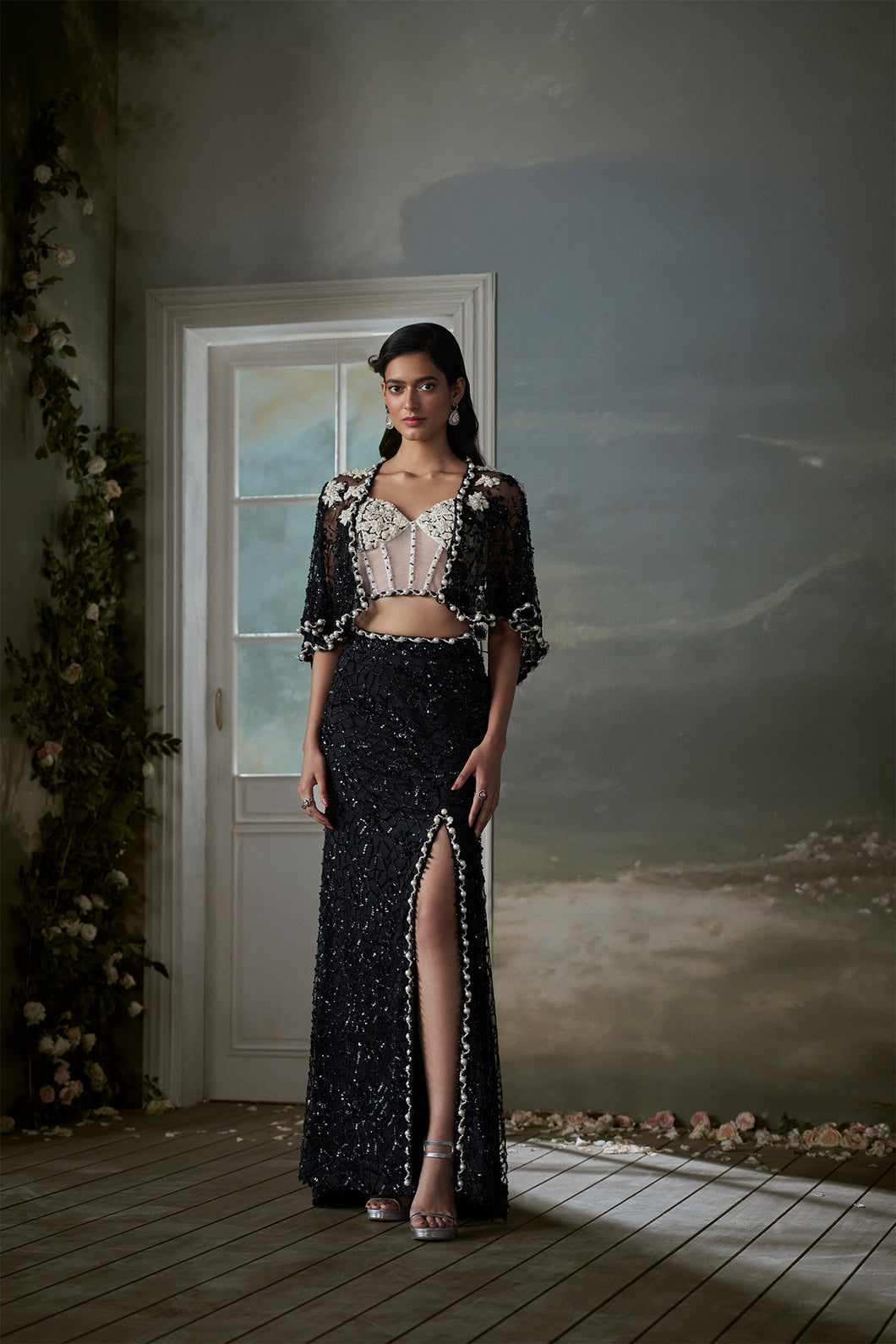 Black skirt and jacket set with an ivory corset