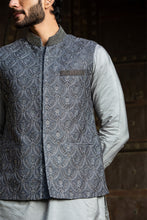 Load image into Gallery viewer, STEEL GREY  KURTA AND PANT WITH ALL OVER EMBROIDERED RAW SILK NEHRU JACKET
