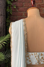 Load image into Gallery viewer, Powder Blue Pre-draped saree with Zari work Bustier
