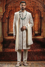 Load image into Gallery viewer, Beige Raw Silk moti Embroidered sherwani
