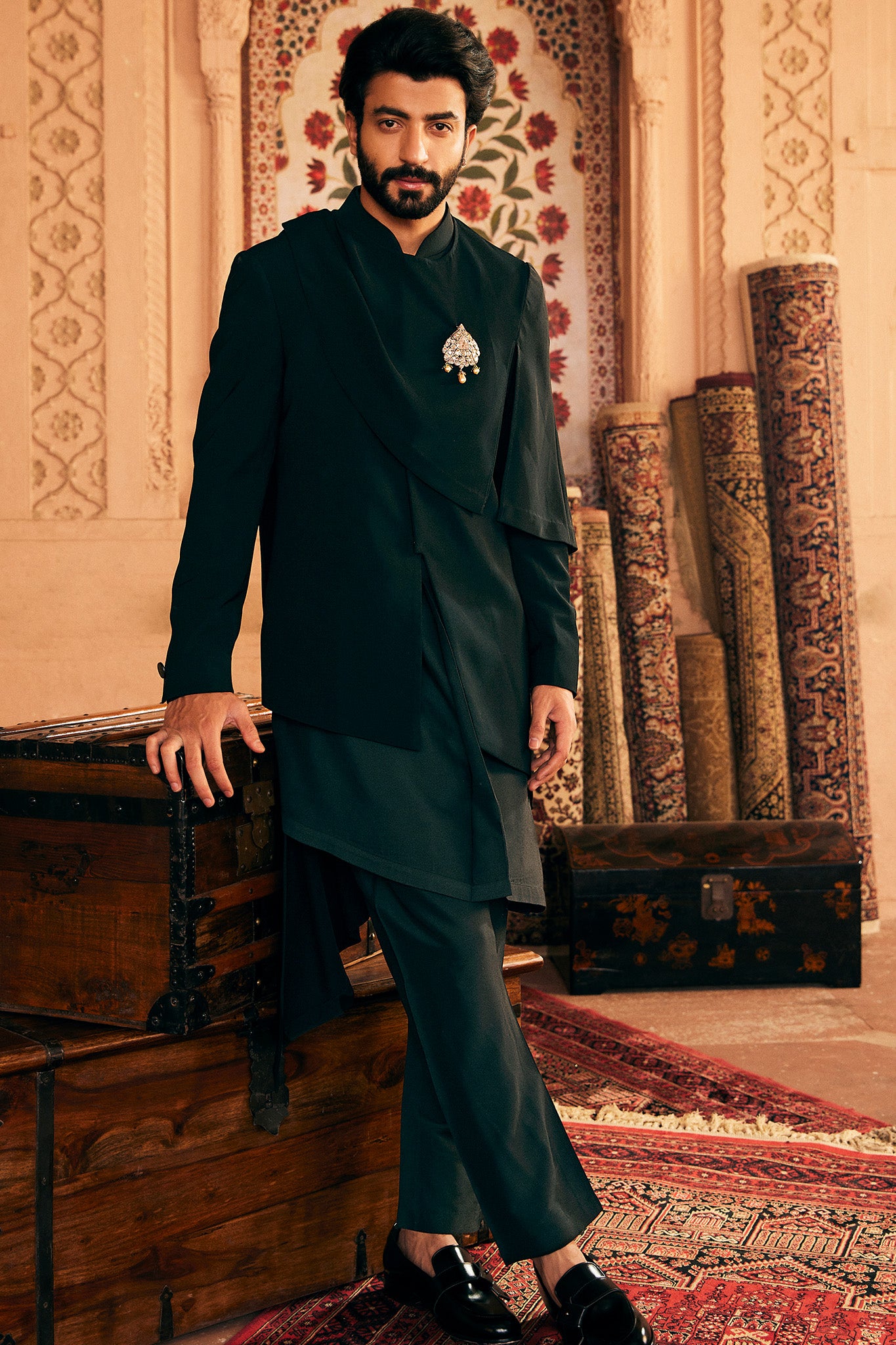Asymmetric Allure: Indo-Inspired Ensemble with Gilded Brooch Accent