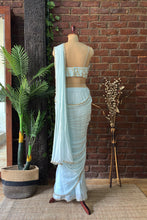 Load image into Gallery viewer, Powder Blue Pre-draped saree with Zari work Bustier
