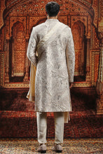 Load image into Gallery viewer, Beige Raw Silk moti Embroidered sherwani
