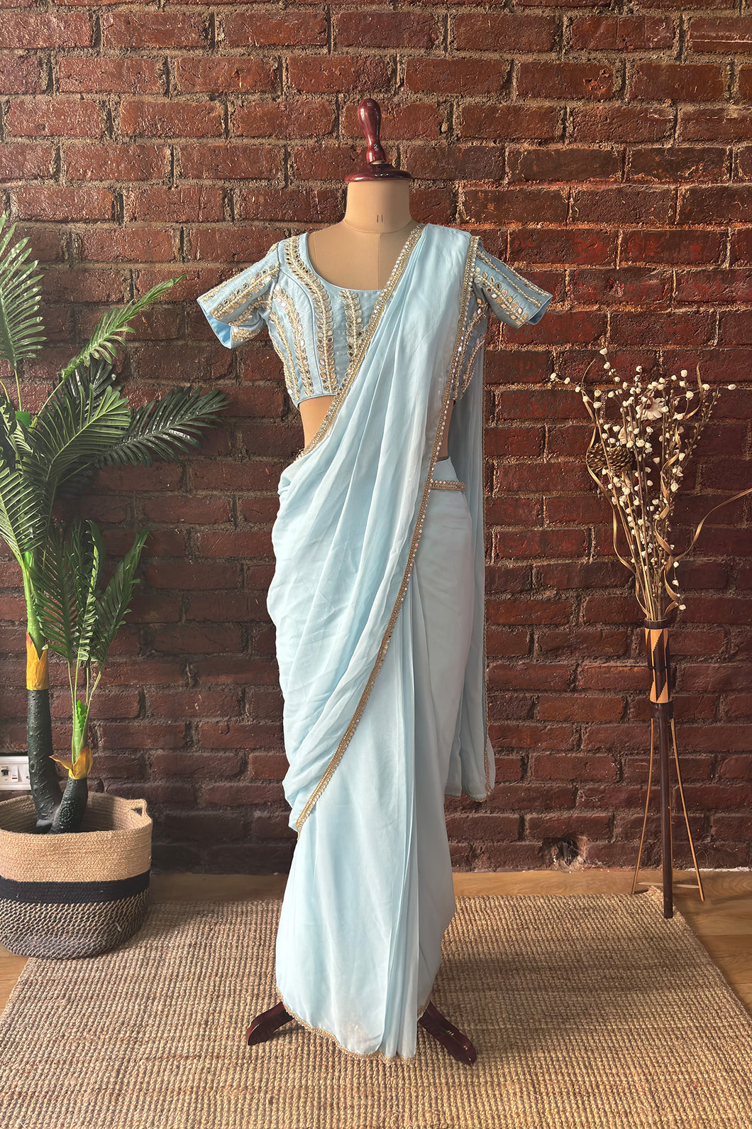 Sky Blue Pre-draped saree with mirror work blouse
