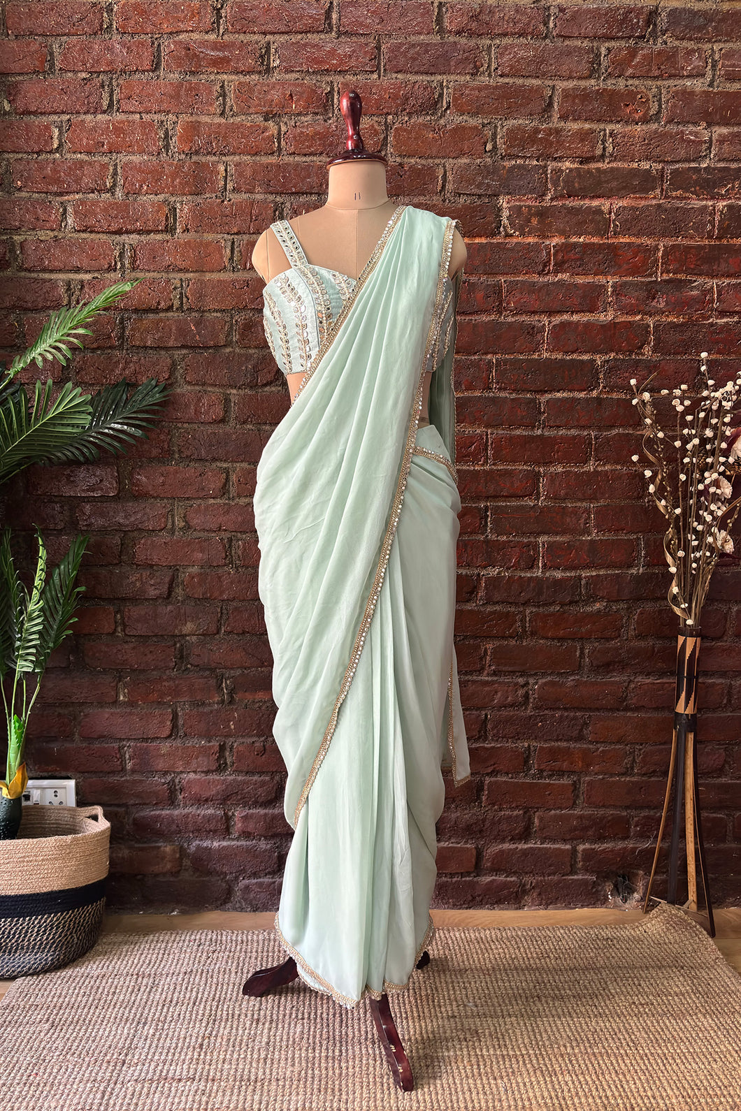 Mint Pre-draped saree with mirror work blouse