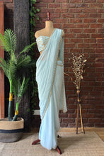 Load image into Gallery viewer, Powder Blue Pre-draped saree with Zari work Bustier
