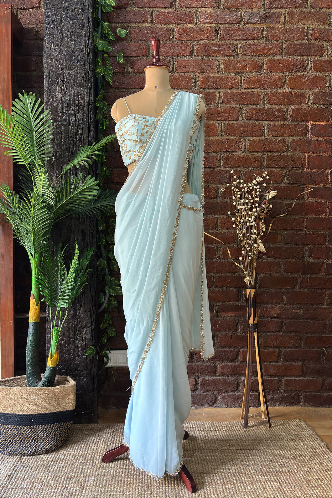 Powder Blue Pre-draped saree with Zari work Bustier