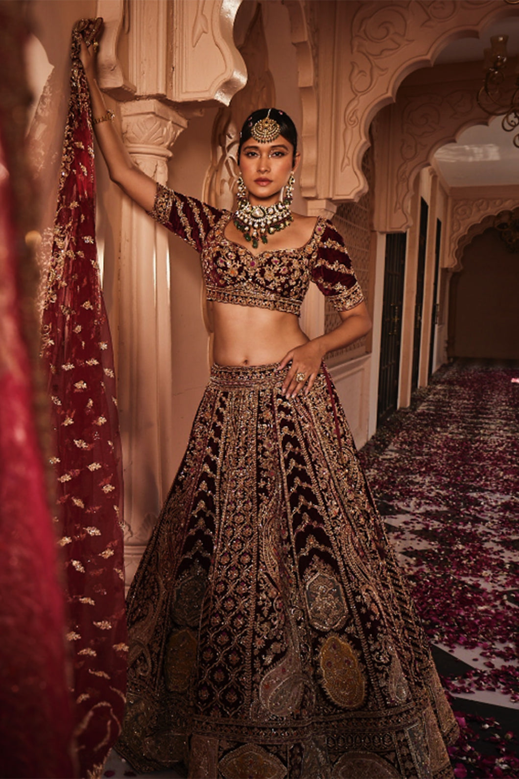 Red heavily embroidered lehenga