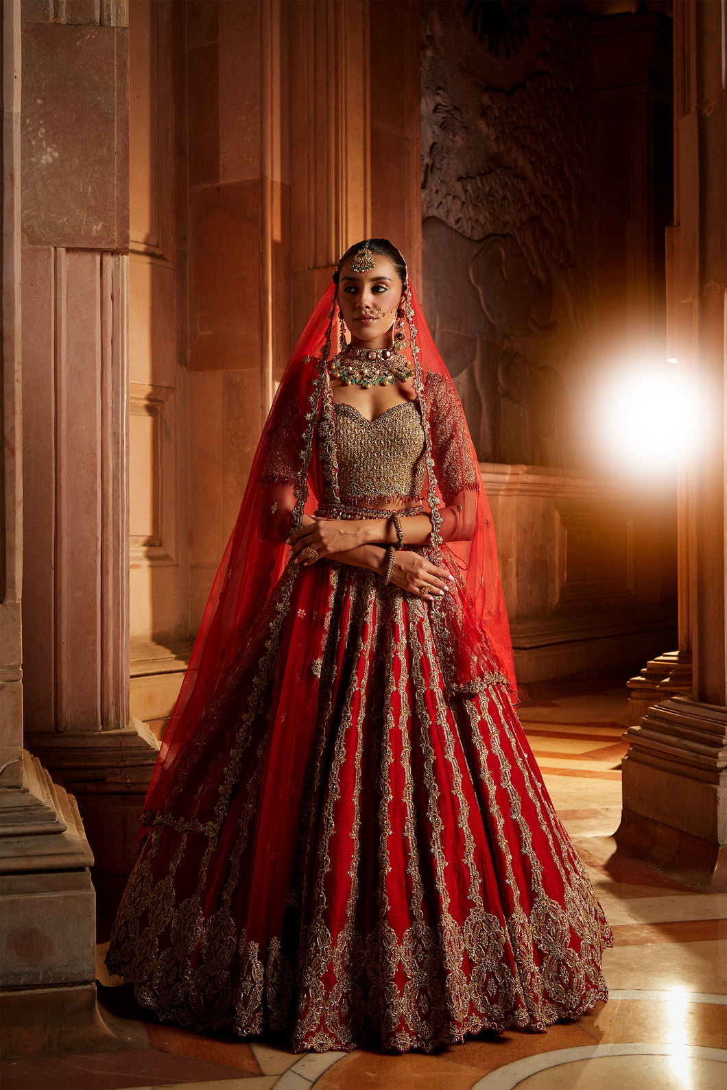 DEEP RED RAW SILK LEHENGA WITH GOLD CHOLI AND TULLE DUPATTA