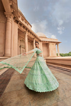 Load image into Gallery viewer, VIBRANT MINT GREEN TULLE LEHENGA CHOLI DUPATAA WITH A WORKED BELT
