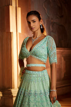 Load image into Gallery viewer, VIBRANT MINT GREEN TULLE LEHENGA CHOLI DUPATAA WITH A WORKED BELT
