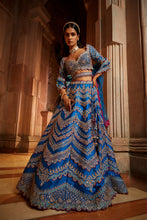 Load image into Gallery viewer, PEACOCK BLUE TAFETTA LEHENGA CHOLI WITH A TULLE DUPATTA AND BELT
