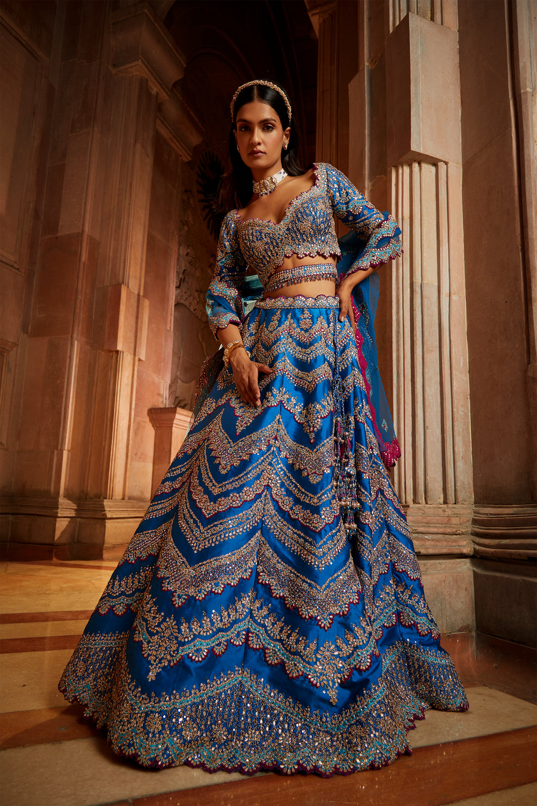 PEACOCK BLUE TAFETTA LEHENGA CHOLI WITH A TULLE DUPATTA AND BELT