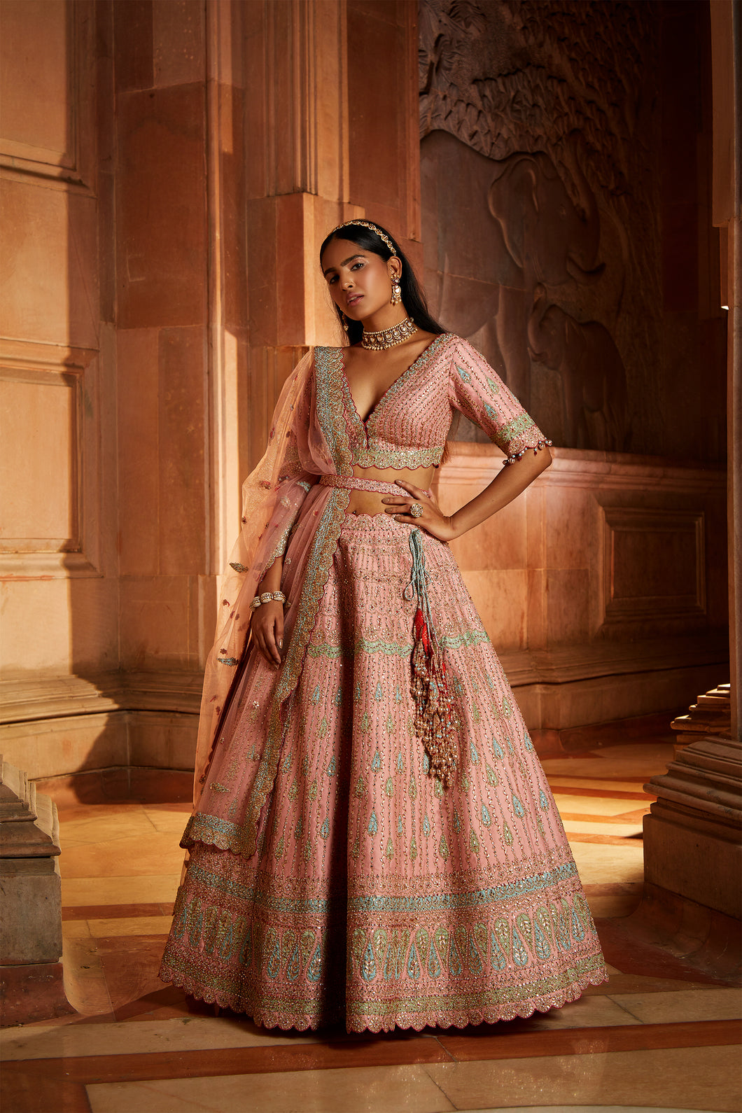 PEACH TAFETTA LEHENGA CHOLI WITH A WORKED BELT AND TULLE DUPATTA