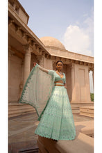 Load image into Gallery viewer, VIBRANT MINT GREEN TULLE LEHENGA CHOLI DUPATAA WITH A WORKED BELT
