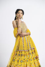 Load image into Gallery viewer, VIBRANT YELLOW PEPLUM LEHENGA SET WITH MULTICOLUR WORK
