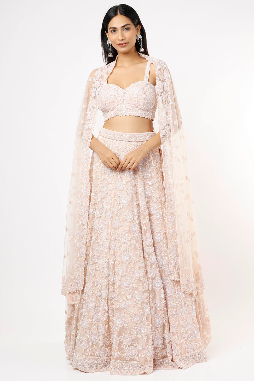 Pink organza self on self embroidered lehenga