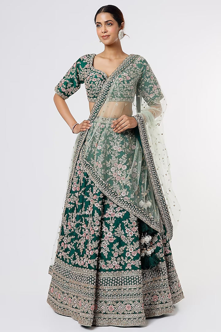 Bottle green raw silk heavily hand Embroidered lehenga