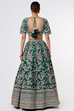Load image into Gallery viewer, Bottle green raw silk heavily hand Embroidered lehenga
