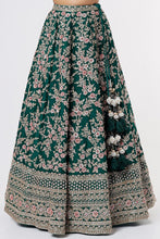 Load image into Gallery viewer, Bottle green raw silk heavily hand Embroidered lehenga
