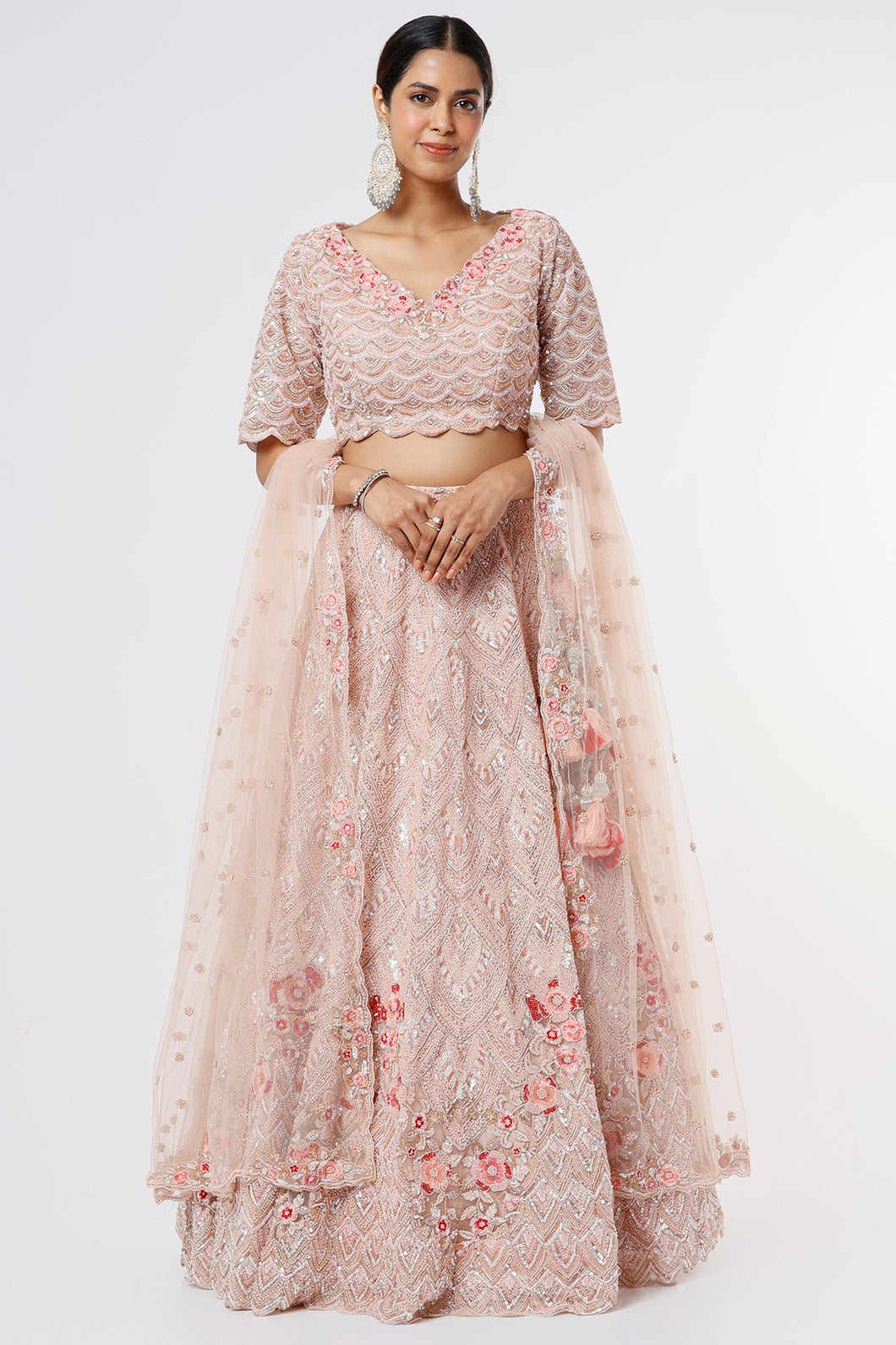 Pink net resham, cutdana, and sequins embroidered lehenga