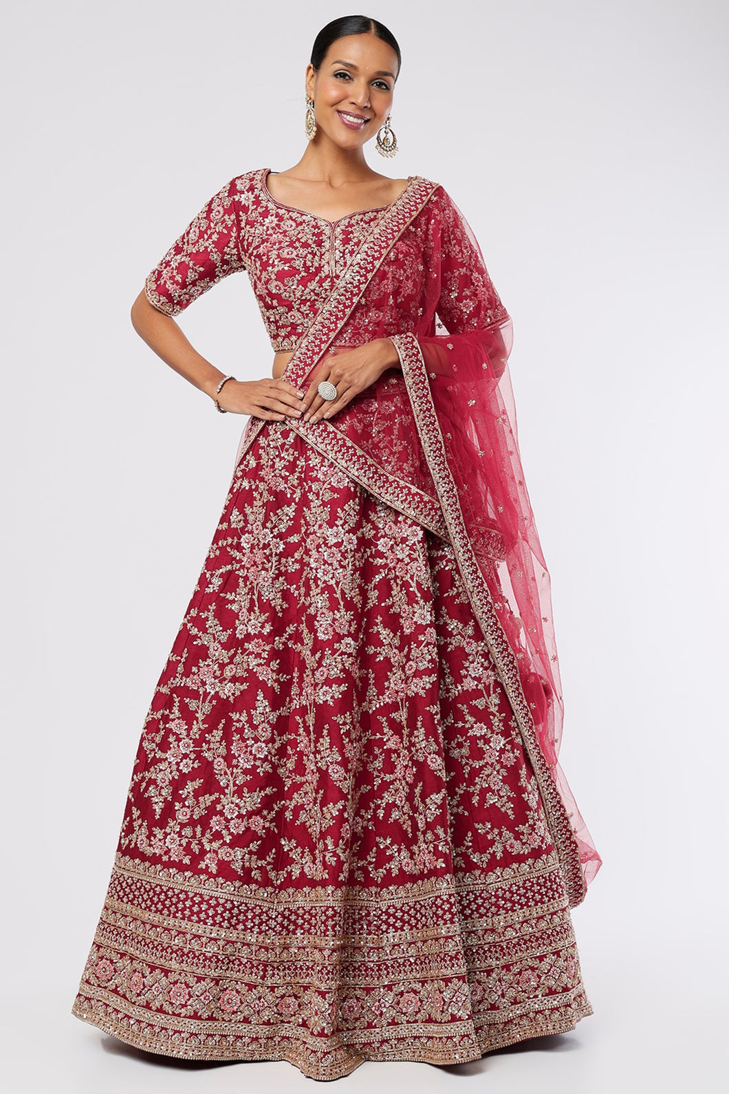 Maroon raw silk heavily hand embroidered lehenga