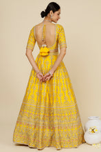 Load image into Gallery viewer, Mustard raw silk sequins and thread embroidered lehenga
