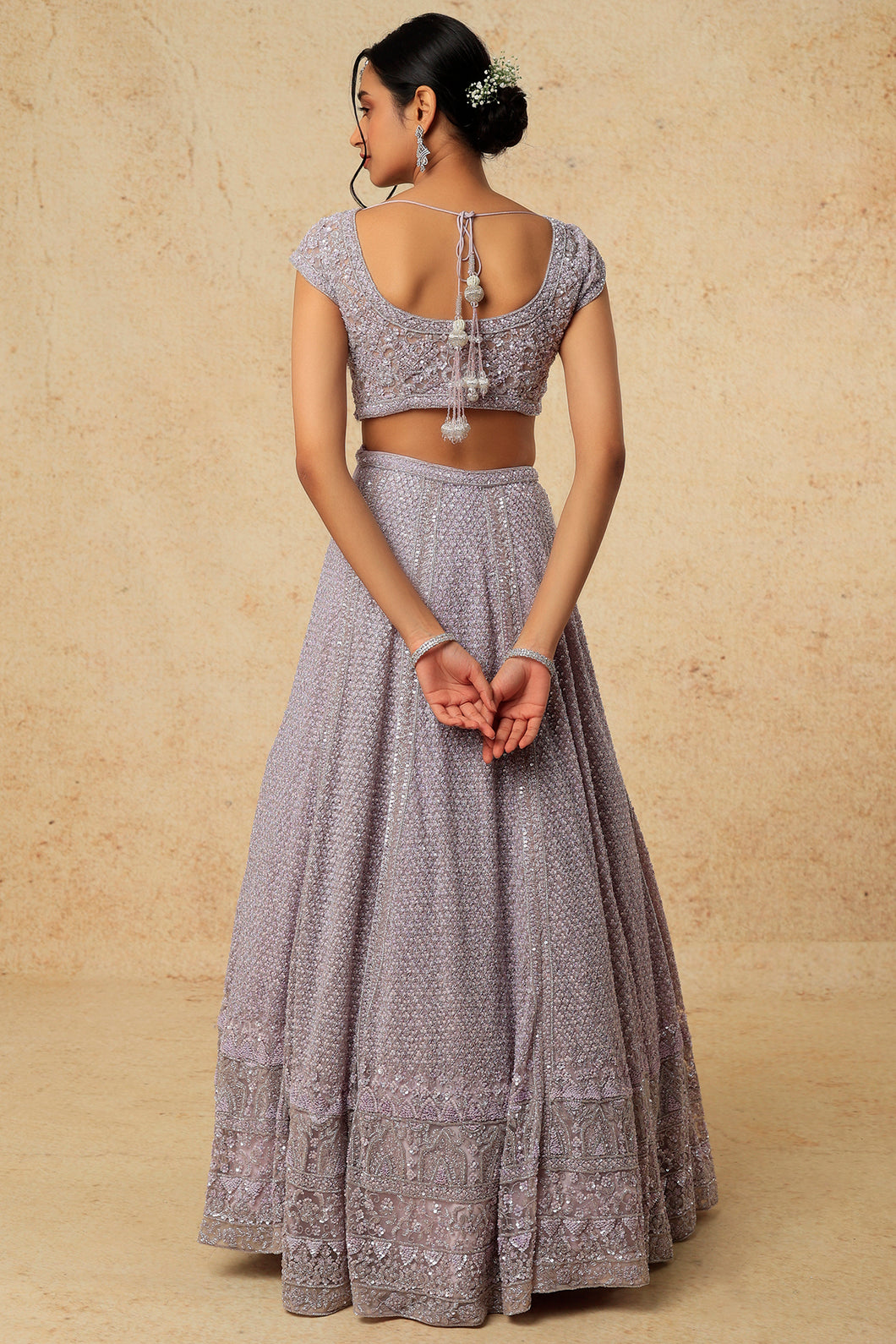Lilac net cut dana, pearl and sequins embroidered lehenga