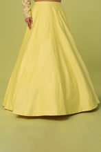 Load image into Gallery viewer, Yellow raw silk heavily embroidered jacket lehenga
