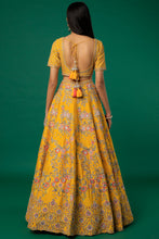Load image into Gallery viewer, Mustard raw silk thread and zari embroidered lehenga
