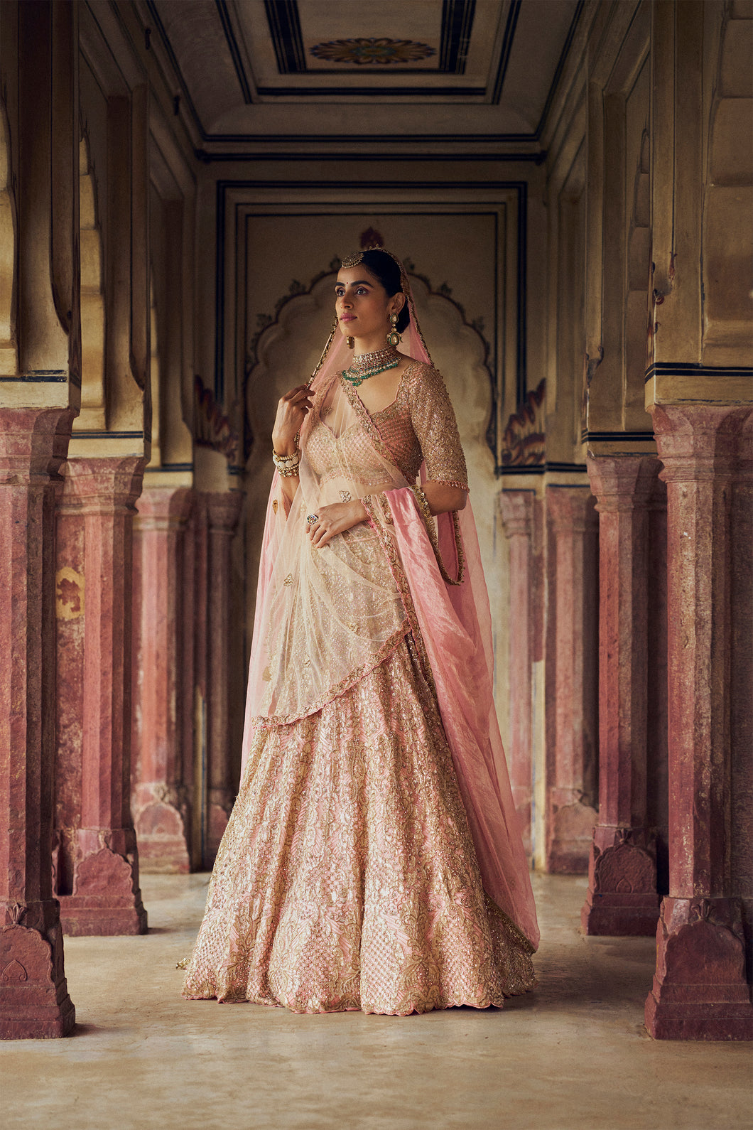 PEACH TULLE LEHENGA CHOLI AND DUPATTA WITH AN OPTIONAL SECOND DUPATTA