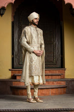 Load image into Gallery viewer, GOLD TWILL MATKA ACHKAN WITH BELT ZARDOZI EMBROIDERED WITH MONGA GATHERED KURTA AND CHURIDAR
