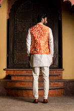 Load image into Gallery viewer, ORANGE RAW SILK EMBROIDERED  NEHRU JACKET WITH KURTA AND PANT
