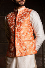 Load image into Gallery viewer, ORANGE RAW SILK EMBROIDERED  NEHRU JACKET WITH KURTA AND PANT
