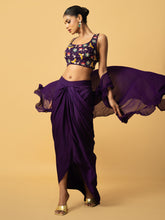 Load image into Gallery viewer, Violet Co - ord set with multi coloured hand embroidery on the blouse . Blouse &amp; dhoti is of modal satin , cape is of georgette
