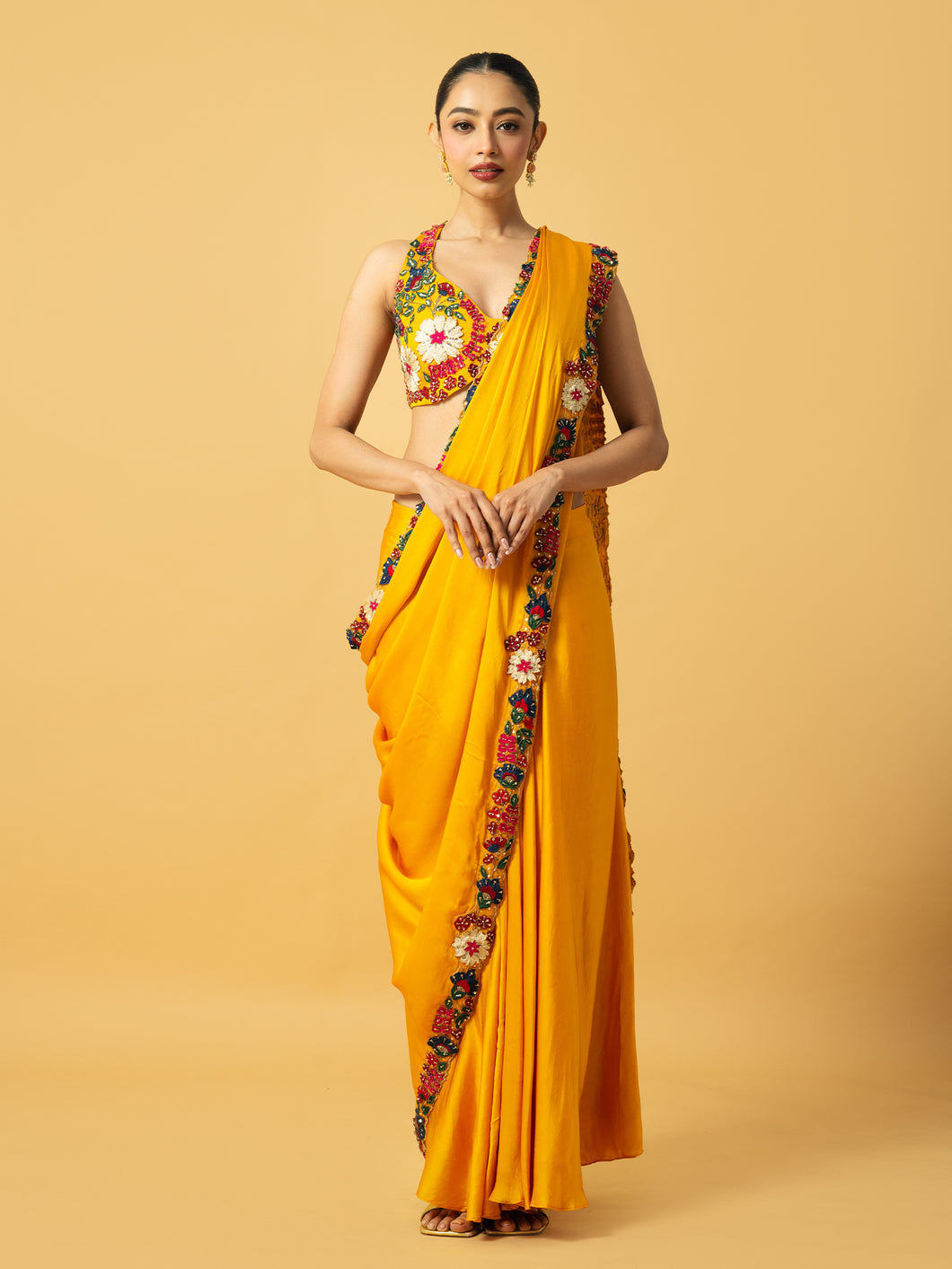 Golden yellow modal satin saree with multi coloured 3D work on blouse and saree edge