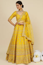 Load image into Gallery viewer, Mustard raw silk sequins and thread embroidered lehenga
