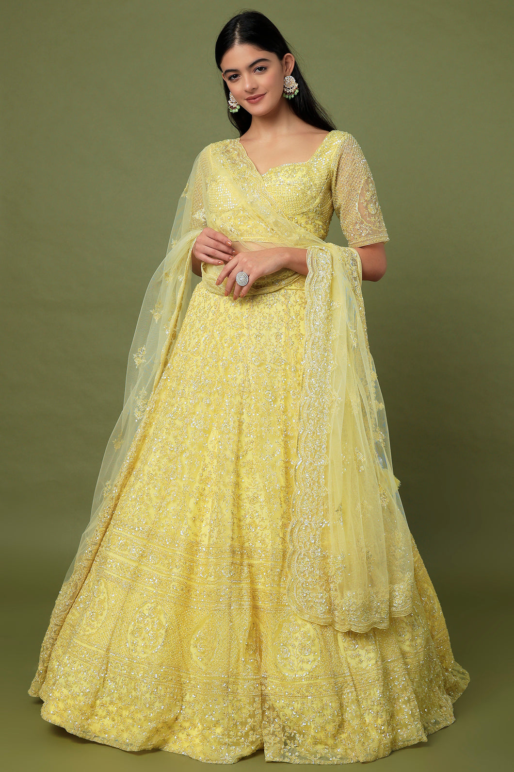 Yellow net sequins and cutdana embroidered lehenga